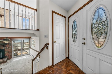 Start your summer 2026 in this prime bay front bi-level nestled - photo 9