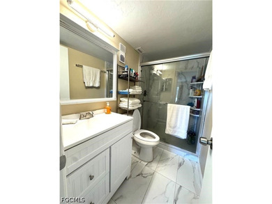 If you're looking for a peaceful 55+ condo for yourself or a - photo 11