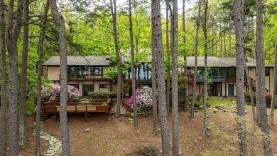 Private drive off a gated road leads to this home tucked among - photo 46