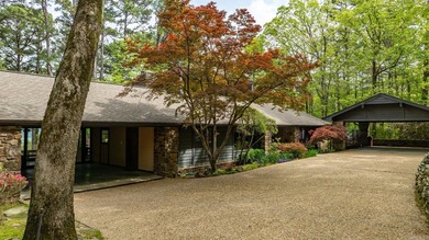 Private drive off a gated road leads to this home tucked among - photo 48