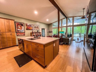 Lake living in HSV! So many options for this mid-century beauty - photo 9