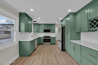 Welcome home to this beautifully remodeled ranch where modern - photo 12