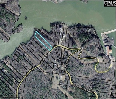 Your lakeside retreat awaits! This 1.78 acre waterfront lot on - photo 14