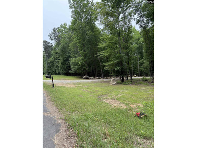 Your lakeside retreat awaits! This 1.78 acre waterfront lot on - photo 15