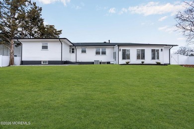 Welcome home to this beautifully remodeled ranch where modern - photo 39