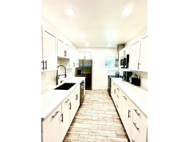 This substantially remodeled corner lot home in the serene - photo 4