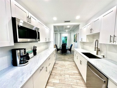 This substantially remodeled corner lot home in the serene - photo 5