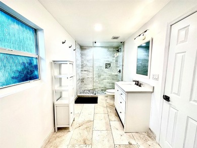 This substantially remodeled corner lot home in the serene - photo 10