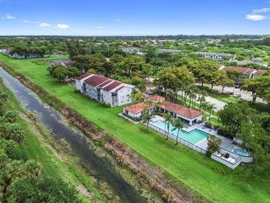 Welcome to this inviting second-floor condo in West Palm Beach - photo 13