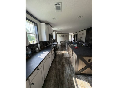 REDUCED! Move-In Ready 2025 Manufactured Home with Waterfront - photo 5