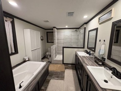 REDUCED! Move-In Ready 2025 Manufactured Home with Waterfront - photo 9