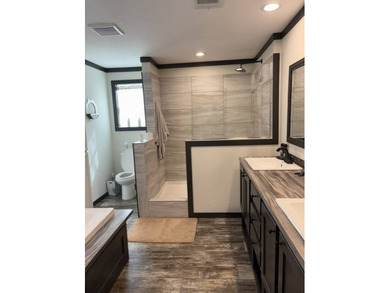 REDUCED! Move-In Ready 2025 Manufactured Home with Waterfront - photo 10