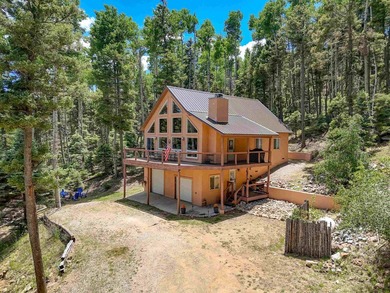 Nestled among the tall pines of Angel Fire, this warm and - photo 5