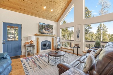 Nestled among the tall pines of Angel Fire, this warm and - photo 9