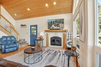 Nestled among the tall pines of Angel Fire, this warm and - photo 10