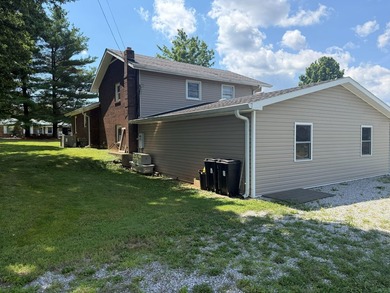 Welcome to this well-maintained 4-bedroom, 2-bathroom - photo 6
