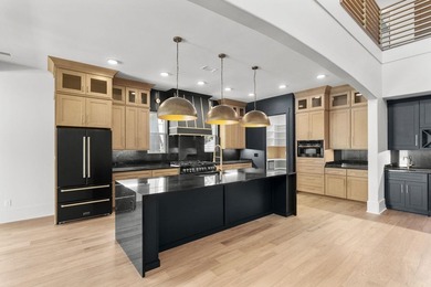 Custom luxury living in The Bluffs on the Waterway. This - photo 9
