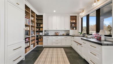 This exceptional property offers space, functionality, and - photo 15