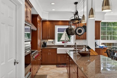 Perched above Shoestring Bay, this magnificent waterfront - photo 24