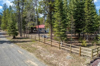 NEW PRICE! Tucked away on a peaceful, fenced .49-acre wooded lot - photo 33