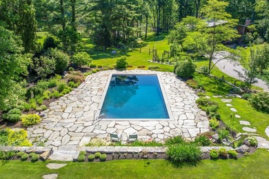 Surrounded by beautifully landscaped grounds with glimpses of - photo 35