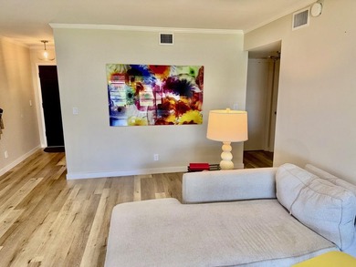 Beautifully renovated 2nd story lake front condominium in a - photo 10