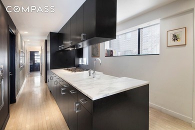 This gorgeous four bedroom, four bathroom triplex condominium is - photo 3