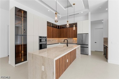 Experience elevated Florida living in this exceptional 4-bedroom - photo 9