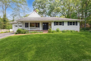 Welcome to this charming 3-bedroom, 2-bath home tucked away on a - photo 1