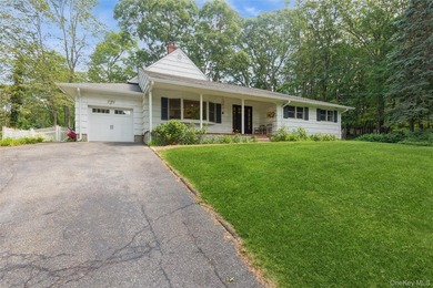Welcome to this charming 3-bedroom, 2-bath home tucked away on a - photo 3