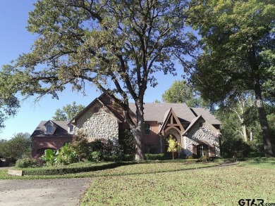 EXCEPTIONAL WATERFRONT HOME W/ BOATHOUSE FOR SALE ON LAKE TYLER - Lake Home For Sale in Whitehouse, Texas