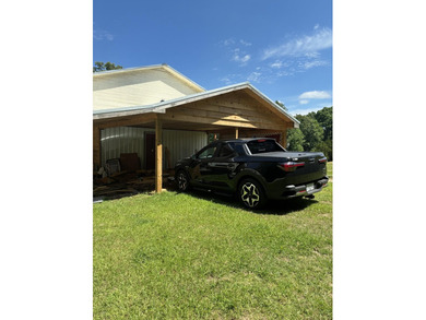 Tucked away in a peaceful country setting, this 3-bedroom - photo 16