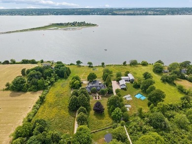 Waterfront living on Tiverton's coveted Neck Road. Set on - photo 2