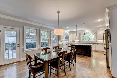 This beautifully updated brick traditional home is in the - photo 23