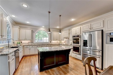 This beautifully updated brick traditional home is in the - photo 25
