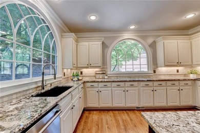 This beautifully updated brick traditional home is in the - photo 26