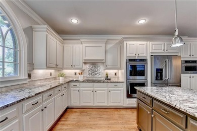 This beautifully updated brick traditional home is in the - photo 28