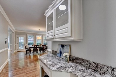 This beautifully updated brick traditional home is in the - photo 31