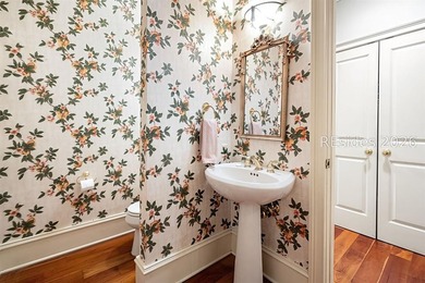 Welcome to 3 Wood Duck Court, a gracious island residence tucked - photo 37