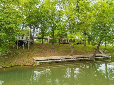 Tucked away in the natural beauty of Royal, Arkansas, this warm - photo 1