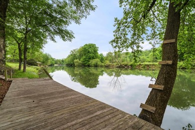 Tucked away in the natural beauty of Royal, Arkansas, this warm - photo 4