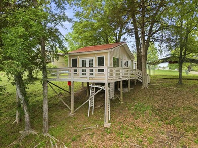 Tucked away in the natural beauty of Royal, Arkansas, this warm - photo 5