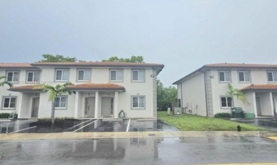 Lake Townhome/Townhouse For Sale in Opa-Locka, Florida
