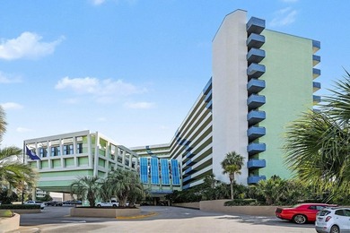 Welcome to this ocean-view efficiency condo at the prestigious - photo 1