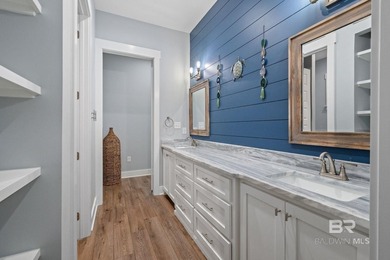 Tucked away on a quiet cul-de-sac within the gated community of - photo 32