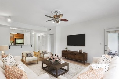 Welcome to this bright and inviting two-bedroom condo, ideally