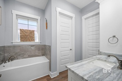 Tucked away on a quiet cul-de-sac within the gated community of - photo 37
