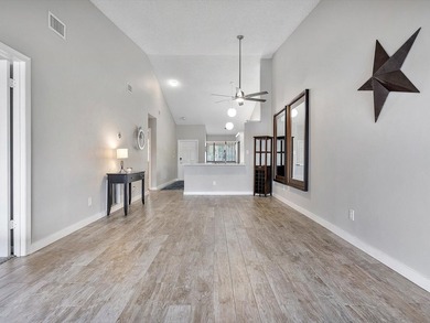 Beautifully renovated top-floor condo with serene lake views in - photo 7