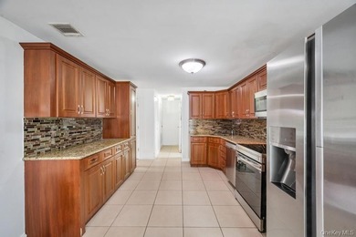 Welcome to 32 Beverly Street in Islip, a spacious Colonial - photo 5