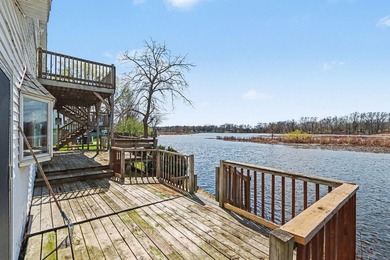 Nestled along the scenic St. Joseph River, this spacious - photo 3